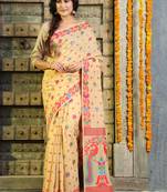 Beige hand woven banarasi saree with blouse