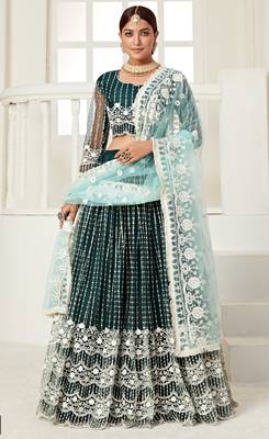 Mesmerizing Dark Green colored thread with sequins embroidered Heavy Non-non net fabric lehenga choli for wedding 1