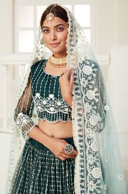 Mesmerizing Dark Green colored thread with sequins embroidered Heavy Non-non net fabric lehenga choli for wedding 2