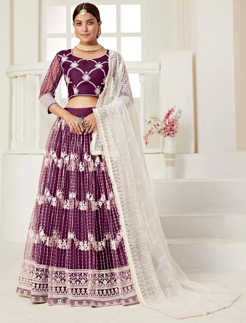 Delightful Wine colored thread with sequins embroidered Heavy Non-non Net fabric Party wear Lehenga choli