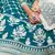 Graceful Teal Green colored thread with sequins embroidered Heavy Non-non Net fabric Lehenga designs