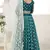 Graceful Teal Green colored thread with sequins embroidered Heavy Non-non Net fabric Lehenga designs