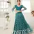 Graceful Teal Green colored thread with sequins embroidered Heavy Non-non Net fabric Lehenga designs
