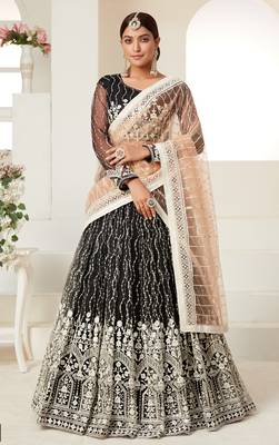 Captivating Black colored thread with sequins embroidered Heavy Non-non Net Party wear Lehenga choli 1