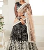 Captivating Black colored thread with sequins embroidered Heavy Non-non Net Party wear Lehenga choli