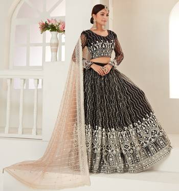 Captivating Black colored thread with sequins embroidered Heavy Non-non Net Party wear Lehenga choli 3