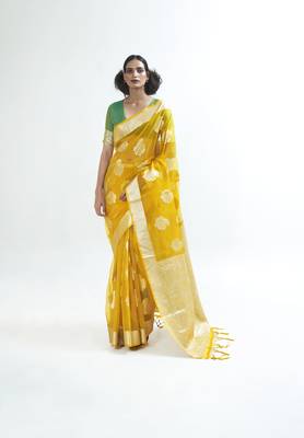 Yellow woven organza saree with blouse 1