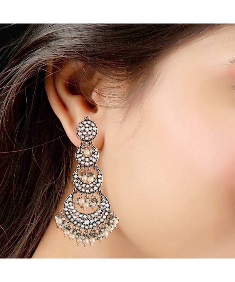 Silver Oxidised Intricately Designed Traditional Earrings with Hair Chain Encased With Kundans & Pearls 