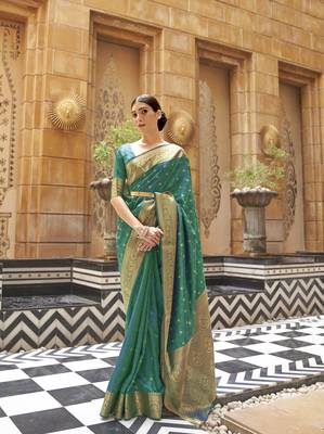 Green woven silk saree with blouse 1