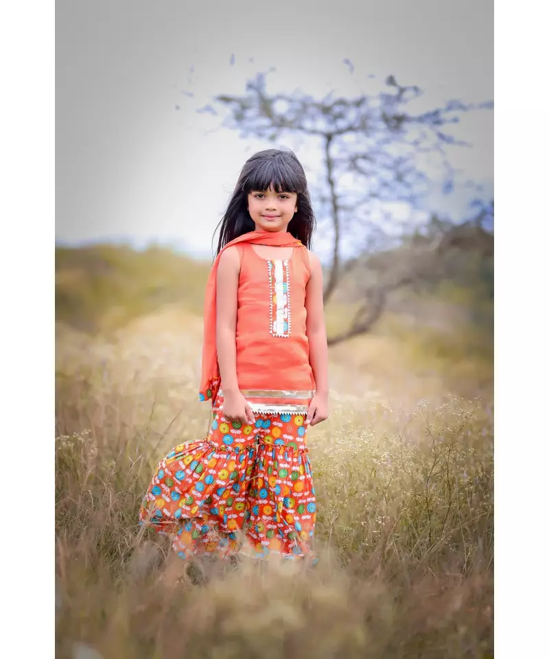 Orange Printed Short Kurta with Flower print sharara and Dupatta