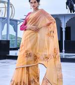 Light yellow printed organza saree with blouse