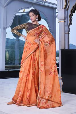 Orange printed organza saree with blouse 1