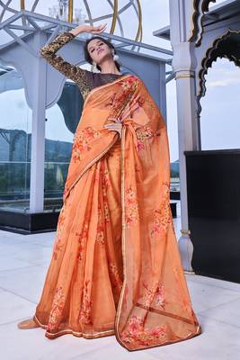 Orange printed organza saree with blouse 2