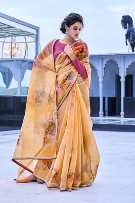 Mustard printed organza saree with blouse 1