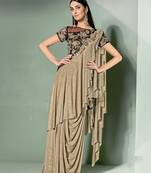 Beige embroidered lycra saree with blouse
