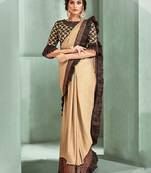 Beige embroidered lycra saree with blouse