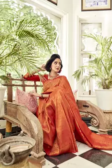 Red woven banarasi saree with blouse