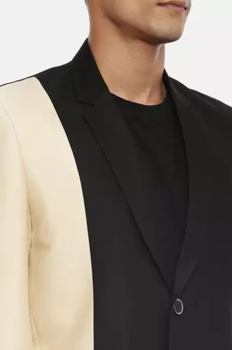 3 color classic two button blazer with silver rim buttons. pair with black pants for a cocktail evening.