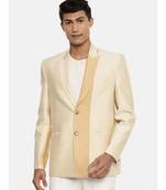 gold beige two button blazer for a sangeet evening . pair with ivory pants to complete the look.