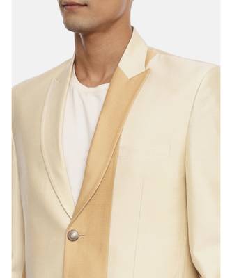 gold beige two button blazer for a sangeet evening . pair with ivory pants to complete the look. 2