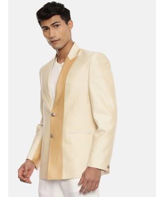 gold beige two button blazer for a sangeet evening . pair with ivory pants to complete the look. 3