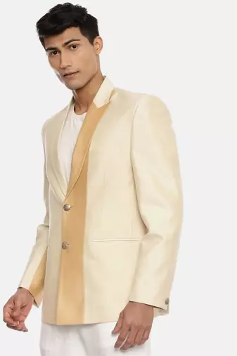 gold beige two button blazer for a sangeet evening . pair with ivory pants to complete the look.