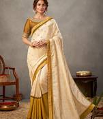 Off white embroidered tussar silk saree with blouse