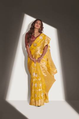 Yellow woven organza saree with blouse 1