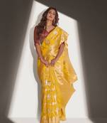 Yellow woven organza saree with blouse