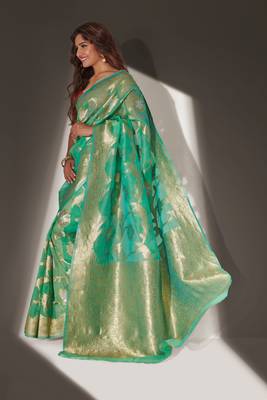Green woven organza saree with blouse 1