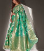 Green woven organza saree with blouse