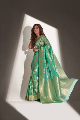 Green woven organza saree with blouse 4