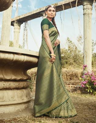 Dark green woven banarasi silk saree with blouse 1