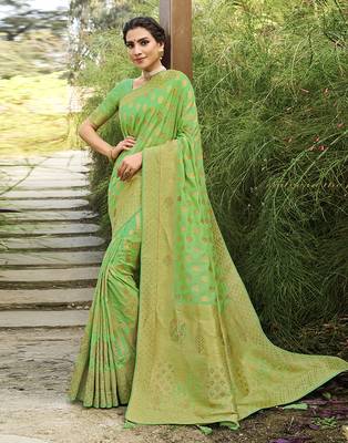 Green woven banarasi silk saree with blouse 1