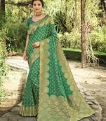 Green woven banarasi silk saree with blouse