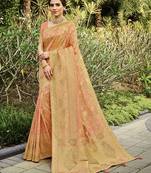 Peach woven banarasi silk saree with blouse