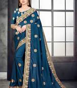 Dark blue embroidered pure silk saree with blouse