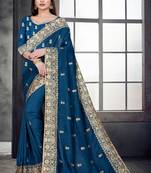 Dark blue embroidered pure silk saree with blouse