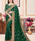 Green embroidered pure silk saree with blouse