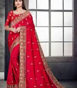 Red embroidered pure silk saree with blouse