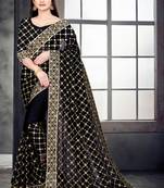 Black embroidered georgette saree with blouse