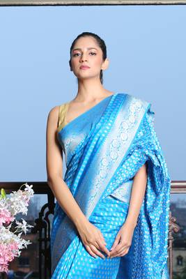 Sky blue silk saree with golden border and buti 2