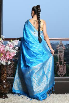 Sky blue silk saree with golden border and buti 4