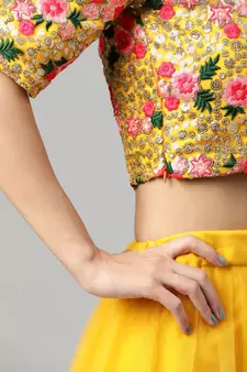 Lime Yellow Thread And Sequins Embroidered Net Semi Stitched Bridal Lehenga