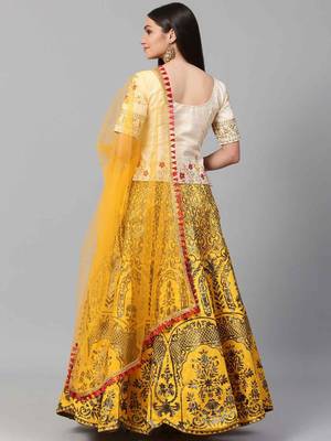 Yellow embroidered silk semi stitched lehenga 2