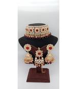 Gold Plated choker set with earrings and Maangtikka in Maroon color