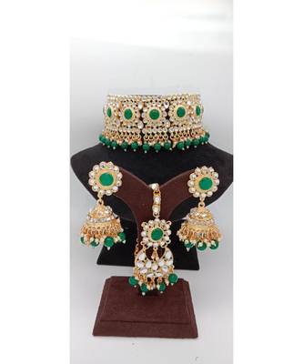 Gold Plated choker set with earrings and Maangtikka in Green color 1