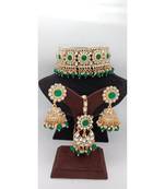 Gold Plated choker set with earrings and Maangtikka in Green color