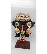 Gold Plated choker set with earrings and Maangtikka in Multicolor color