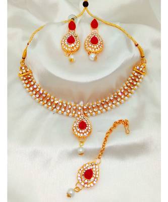 Gold plated jewelry set with earrings and Maangtikka in Maroon color 1